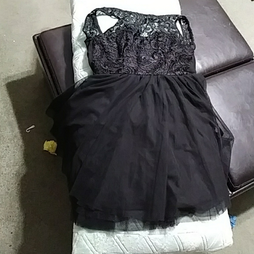 A black shear lace dress